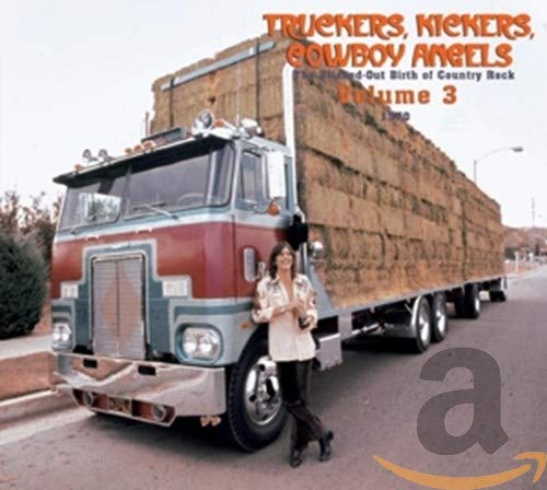 CD cover: Truck, woman, and stacks of hay bales on a road.