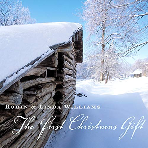 Snow-covered log cabin with album title “The First Christmas Gift.”