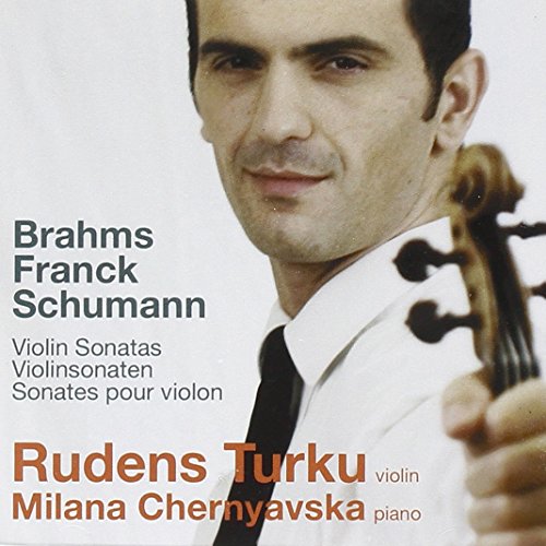 CD cover featuring violinist Rudens Turku with his instrument.