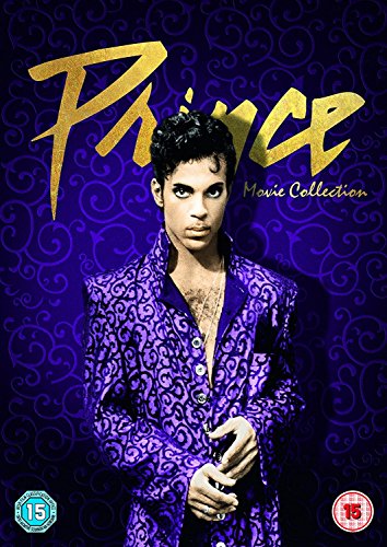 Prince wearing a patterned purple jacket against a dark purple swirling background.