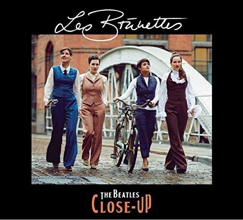 CD cover: four women in 1970s attire with a bicycle, text "The Beatles Close-Up".