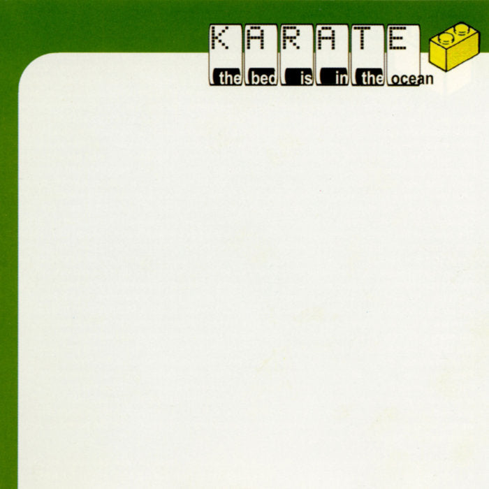 Album cover for Karate’s “The Bed Is in the Ocean” with pixelated text.