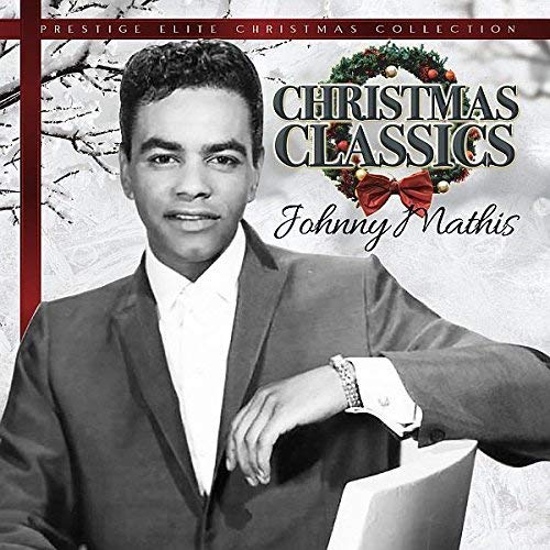 Johnny Mathis “Christmas Classics” CD cover with portrait and wreath.