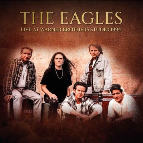 The Eagles band members posing against a textured brown background on a vinyl cover.