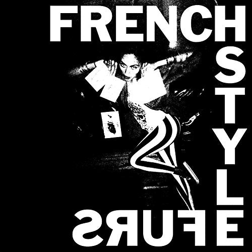 Black and white album cover featuring a person in a dynamic pose.