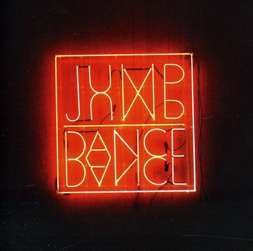 Red neon sign spelling "JUMP DANCE" within a square frame.
