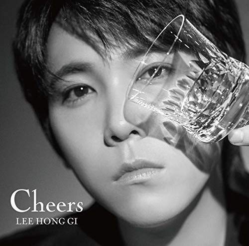 Black and white portrait of Lee Hong-gi with a glass to his face.