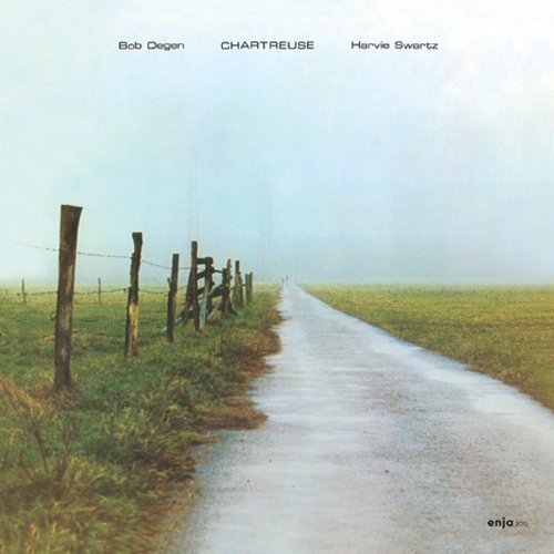 CD cover: rural dirt road with fence posts in misty landscape.