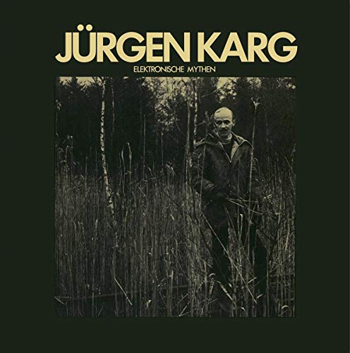 CD cover: Man standing in tall grass within a dark forest.