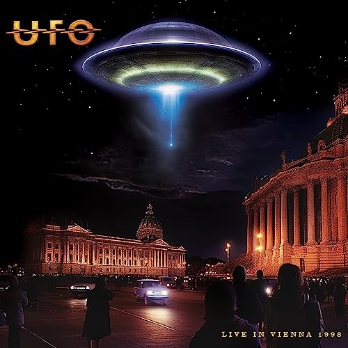 UFO album cover: flying saucer over Vienna cityscape, 1998.