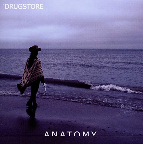 CD cover: person with hat and gun walking on a beach.