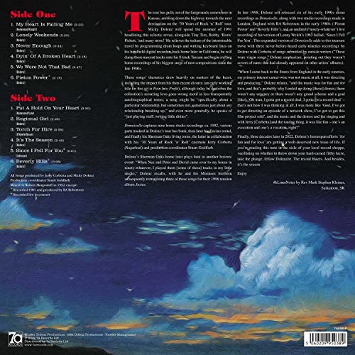Red vinyl record cover featuring a cloudy sky and song list.