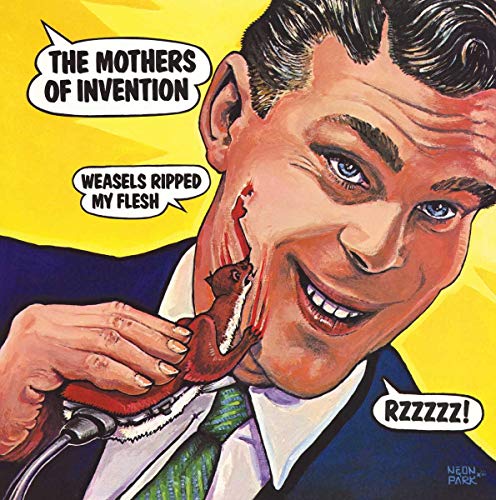 A man smiles while holding a weasel-shaped electric shaver against his bleeding cheek.