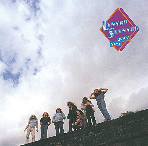 Lynyrd Skynyrd album cover, “Nuthin’ Fancy,” featuring a band on a rooftop.
