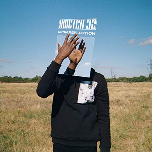 Album cover for Wretch 32’s “Upon Reflection” featuring a person with a reflective panel.