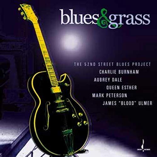 CD cover featuring a yellow guitar against a dark purple background.