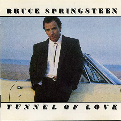 Bruce Springsteen album cover, "Tunnel of Love," featuring a portrait and car.