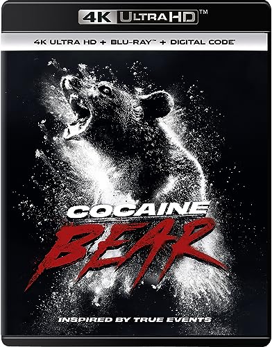 Cocaine Bear" Blu-ray cover featuring a roaring bear amidst white powder.