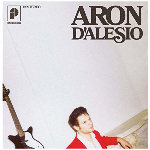 Aron Dalesio album cover with artist portrait and guitar.