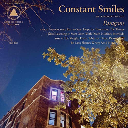 CD cover for Constant Smiles’ “Paragons” featuring a building and trees.