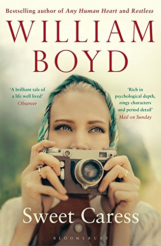 Book cover: woman with vintage camera, title "Sweet Caress" by William Boyd.
