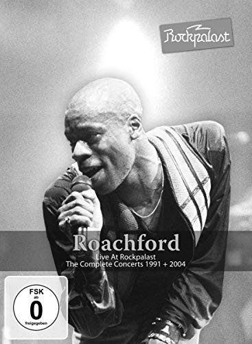 Roachford performing live with a microphone, DVD cover art.