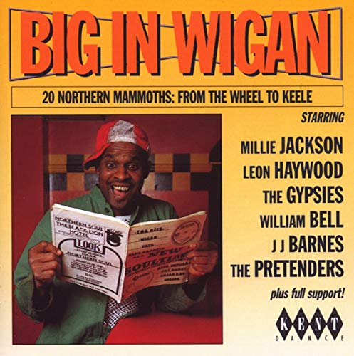 CD cover for “Big In Wigan” featuring a man reading a newspaper.