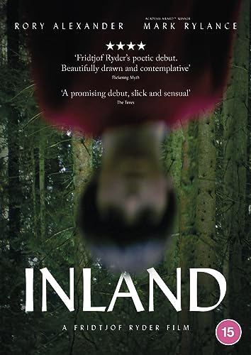 DVD cover for "Inland" featuring a blurred figure in a forest.