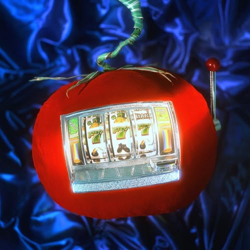 Red pumpkin with a glowing slot machine face showing three sevens.