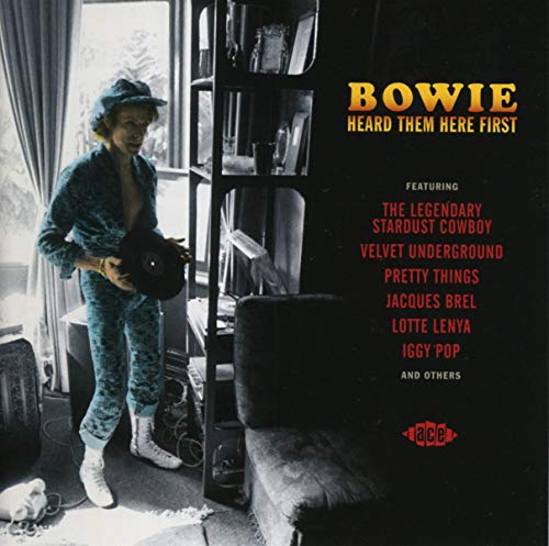 CD cover featuring David Bowie holding a record in a room.