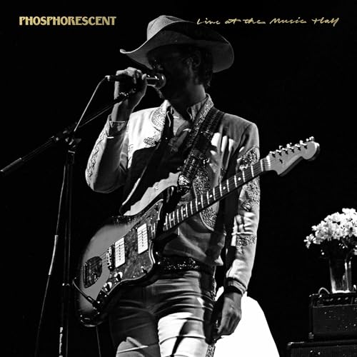 Black and white album cover featuring a musician with a guitar.