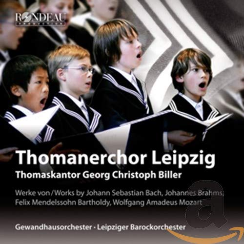 CD cover featuring young boys in choir uniforms singing with sheet music.