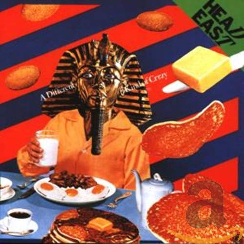 CD cover: Pharaoh head with food items on a vibrant, colorful background.