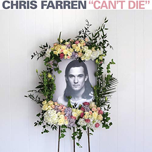 CD cover with a portrait framed by a floral wreath.