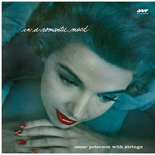 Vinyl record cover: a woman’s face in blue tones, “Oscar Peterson” text.