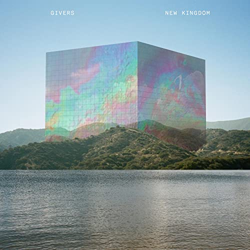 CD cover: iridescent cube reflecting landscape over water and hills.