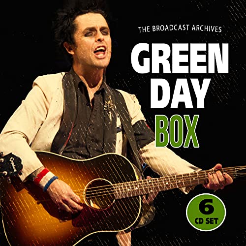 Green Day album cover featuring Billie Joe Armstrong playing guitar.