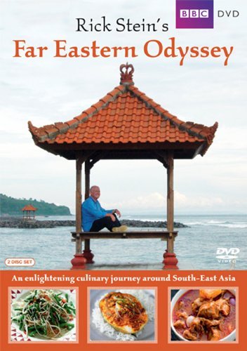 Rick Stein sits in an ornate gazebo overlooking the ocean, DVD cover.