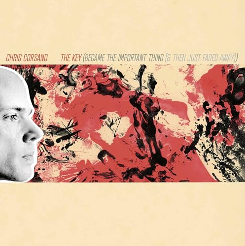 Vinyl album cover with a portrait and red, black paint splatters.