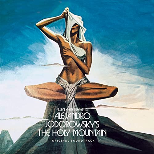 Painted album cover featuring a seated, draped figure on a mountain.