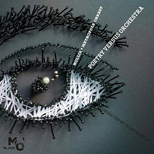 CD cover: an eye made of pins and white thread, dark background.