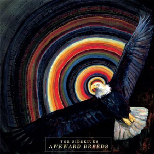 CD cover: colorful spiral background with a soaring eagle and text.