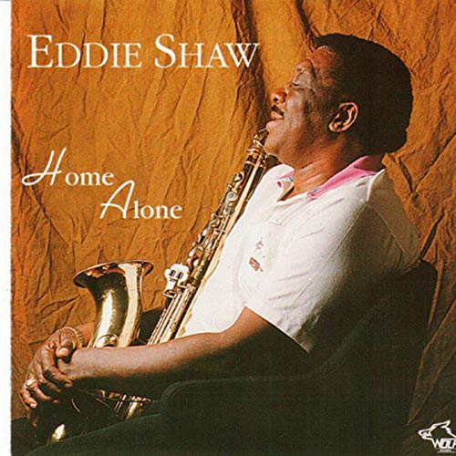 CD cover featuring Eddie Shaw playing a saxophone, orange background.