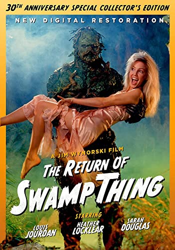 Swamp Thing holds a blonde woman in a pink dress, movie poster.