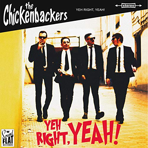 Vinyl record cover featuring four men in suits walking on a street.