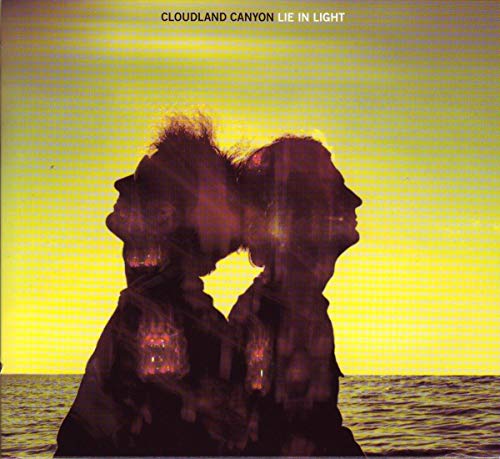 CD cover: two silhouetted figures against a yellow, hazy sky.