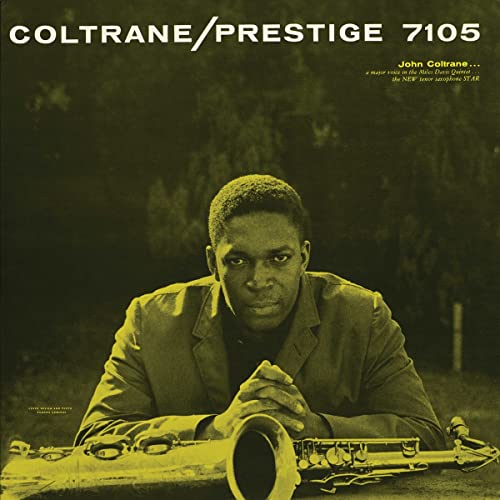 John Coltrane album cover: portrait of musician with saxophone.