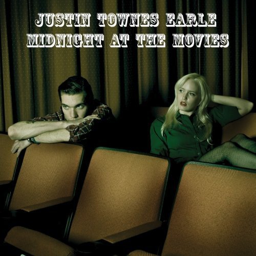 Album cover featuring two people seated in a darkened movie theater.