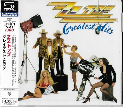 Zz Top “Greatest Hits” CD cover with band and models on set.