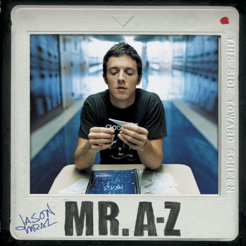 Jason Mraz sits at a desk in a slide-frame cover for the album Mr. A-Z.